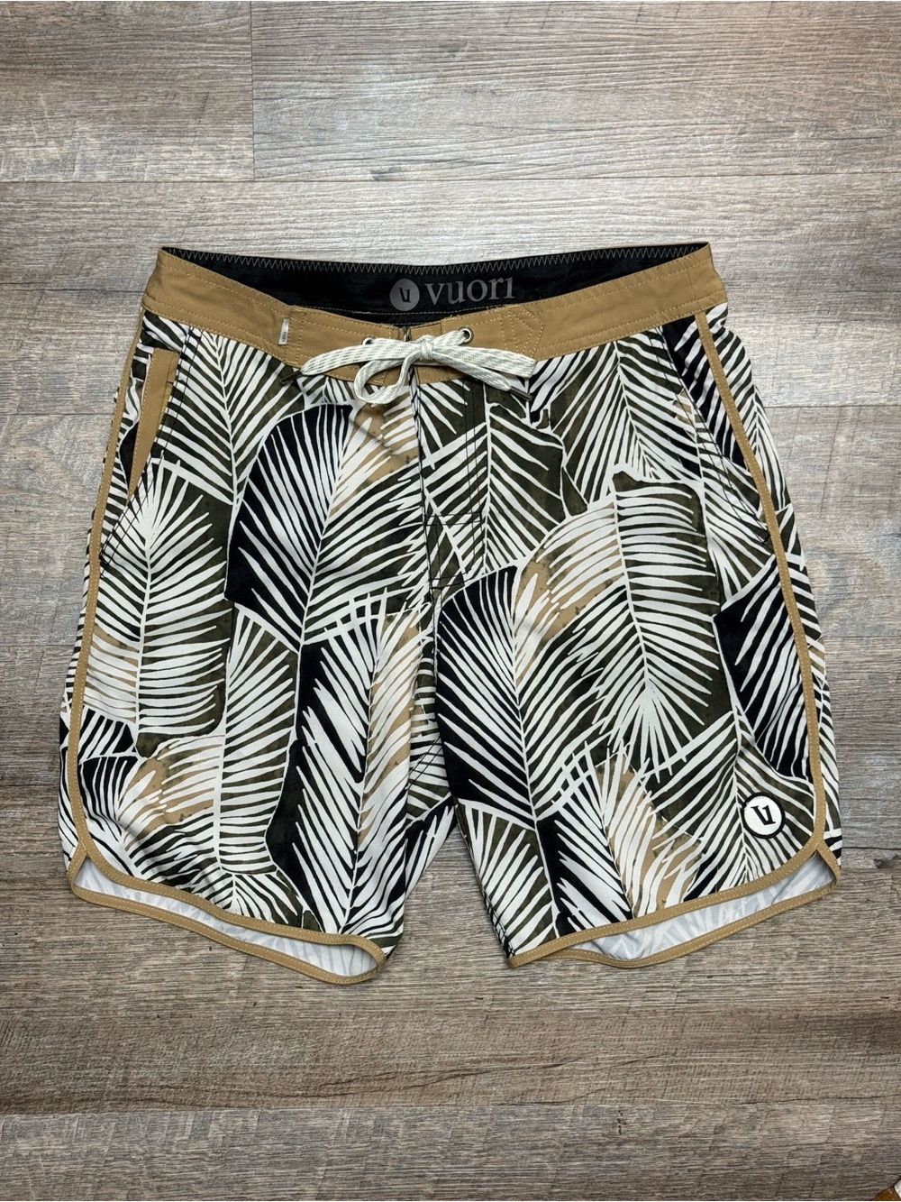 Vuori Palm-Leaf Swim Shorts in Olive, Tan, Black